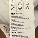 Joseph Ribkoff  Women’s White Laser Cut Detail Raw Hem Ankle Skinny Jeans Size 14 Photo 3