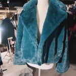 The Comfy rain + rose TEAL GREEN faux fur long sleeve jacket with pockets soft warm New with tag  Smoke and pets free  Same day shipping Faux fur: No ANIMALS WERE HARMED IN THE MAKING OF THIS FASHION THIS GARMENT HAS BEEN HANDCRAFTED BY Rain + Rose STAFF FOR YOUR COMFORT Photo 0