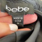 Bebe Black Silk/Spandex Ruffle Front Shirt Dress Button Front Cap Sleeve Size M Photo 2