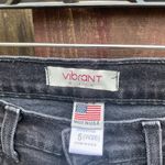Vibrant Distressed Black Women's Jeans Photo 1