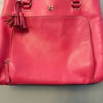 Kate Spade bright coral pink colored tote bag with snap closure and tassels Photo 3