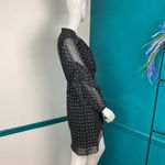 Rachel Roy  polka dot dress with sheer sleeves a ruffle detail. Photo 6