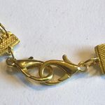 Bright Gold Tone Multi Strand Dangling Heart & Angel Charm Necklace Photo 1