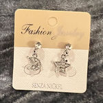 Silver Star and Moon Earrings Photo 0