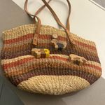 Tote Artisan Straw Tote with Wooden Animal Details Brown Photo 2