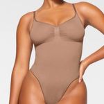 SKIMS EUC Sculpting Thong Bodysuit size L/XL in Sienna Photo 0