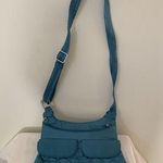 Travelon  RFID Anti Theft Aqua Blue Quilted Crossbody Travel Bag Pockets Purse Photo 0