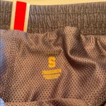 Tracksmith Women’s navy Van Cortlandt “Grande” running short. Blue Photo 4