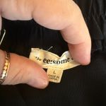 Ee: some NWOT Ruffle Bib Black Jumpsuit with Pockets Photo 3