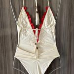 Blue Life  Cream One Piece with Red Floral Accents Photo 1