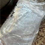 Coach Limited Edition🔥Authentic  pebbled leather zip top wristlet "Wonder woman" Photo 4