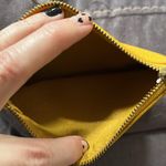 J. McLaughlin yellow leather pouch/wristlet. GUC. Photo 2