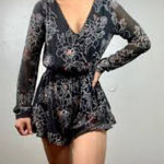 ASTR  Black and White Floral Romper with Bell Sleeves Photo 0