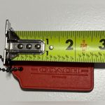 Coach Red Leather Hangtag 1941 with Carriage Stamped
FOB bag charm. Photo 5