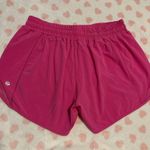 Lululemon hotty hot shorts sonic pink size 8 low rise 4” Photo 1