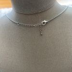 Silver and gold tone Infiniti style necklace Photo 1