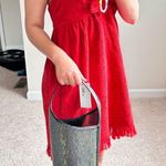 Reformation bucket bag. Photo 6