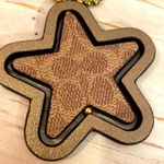 Coach Spinning Star Hangtag in signature canvas Photo 1