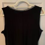 Coco Bianco  sleeveless, black sheath dress with gold chain detail Photo 7