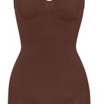 SKIMS seamless sculpting mid thigh bodysuit Photo 0