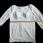 Azazie  Elegant White Long Sleeve Square Neck Wedding Dress with Button Detailing Photo 10