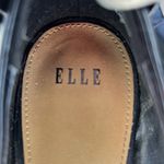 Elle bow on back of the black faux leather platform heels Size 7 M stilettos. Photo 4