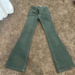 Garnet Hill Cute dark green flare bottom jeans low rise Photo 0
