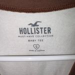 Hollister brown and white baby tee Photo 2