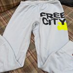 Free City  Gray Track Pants with Black and Yellow Accents Photo 0