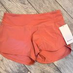 Lululemon  speed up shorts size 8 tall 4”  Photo 0