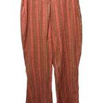 Free People  Fine Line Flare Leg Pant in Rust Combo Size Medium Boho Women's Photo 0