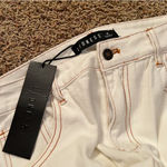 LIONESS White  denim cargo pants with a relaxed fit. New with tags #cargopants #trendy #cute #summer #style Photo 3