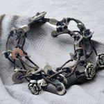 Fossil  multi cord bracelet with silver flowers and discs Photo 0