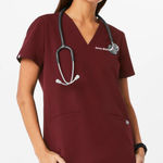 FIGS Women's Casma Three-Pocket Scrub Top in Deep Burgundy.β XS-P Photo 0