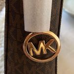 Michael Kors NWT Jet Set Travel Large Logo
Messenger Bag Photo 8