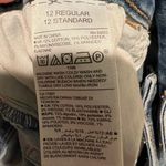 Old Navy  midrise Rockstar medium wash jeans size 12 Photo 7