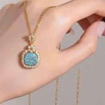 18k Gold Snowflake Necklace Blue Photo 0