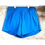 All In Motion Athletic Back Zip Pocket Elastic Waist Logo Shorts Teal size S Photo 2