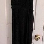 Charlotte Russe Woman’s black jumpsuit size medium with straps. Photo 0