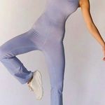 NWOT FP Movement lets Bounce jumpsuit in Lavender Purple Photo 0