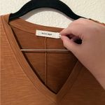 Mod Ref  Sleeveless V-Neck Maxi Dress in Tan Photo 1