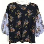 Ann Taylor Loft black floral top contrasting print on balloon sleeve
Size Small Photo 1