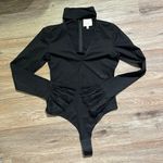 Cinq à Sept Black long sleeve bodysuit in size small from cinq a sept. Photo 0