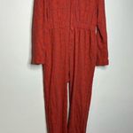 Free People  rust colored eyelet jumpsuit zip up size 4 Photo 0
