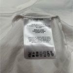  Tee Only worn once, looks and feels brand new. All tags still attached. Elevate your casual wardrobe with this Moncler white t-shirt. Photo 6