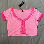 Dolls Kill  pink Y2K Delias top Photo 0