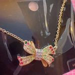 Coach  Diamond paved bow tie necklace Photo 0