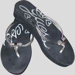 Guess  black foam sandals! Euc! Cute silver sparkle charm on front! Photo 3