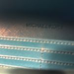 Michael Kors , and fair used condition billfold. I took pictures of the callouts​ Photo 4