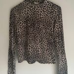 Olivia Rae Leopard Print Turtleneck Photo 0